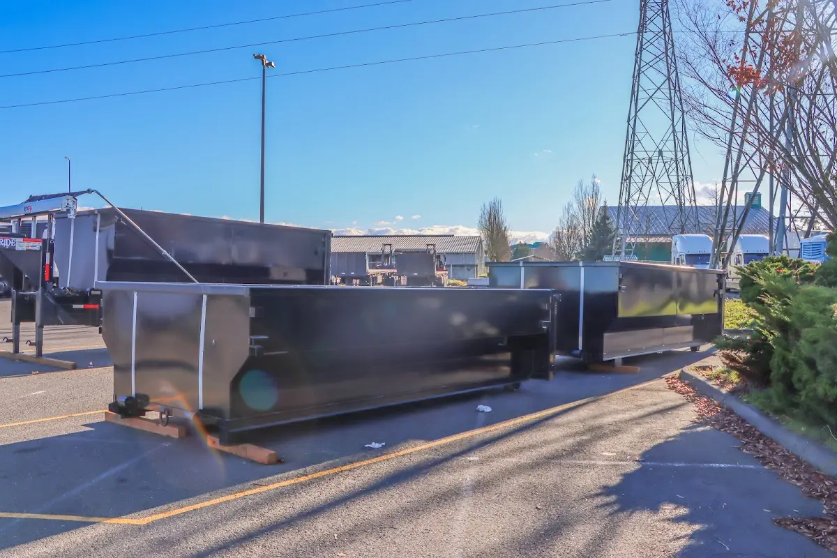Roll-off dumpster ready for waste disposal at job site for Construction Dumpster Rental in Leominster